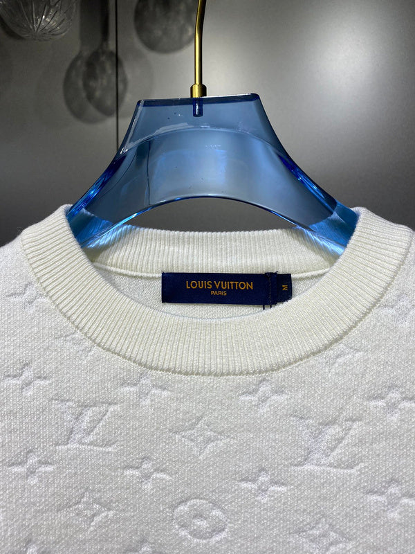 Front view of Louis Vuitton luxury clothing with runway-inspired design