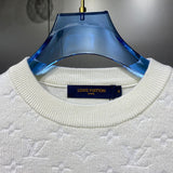 Front view of Louis Vuitton luxury clothing with runway-inspired design