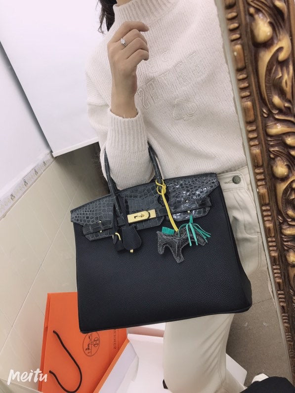  Elegant structured bag carried on shoulder 106
