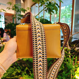  crossbody bag close-up of hardware and finish 23