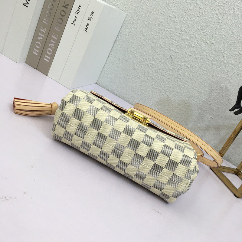 Styled lifestyle shot of elevated modern women's handbag – women's luxury accessory