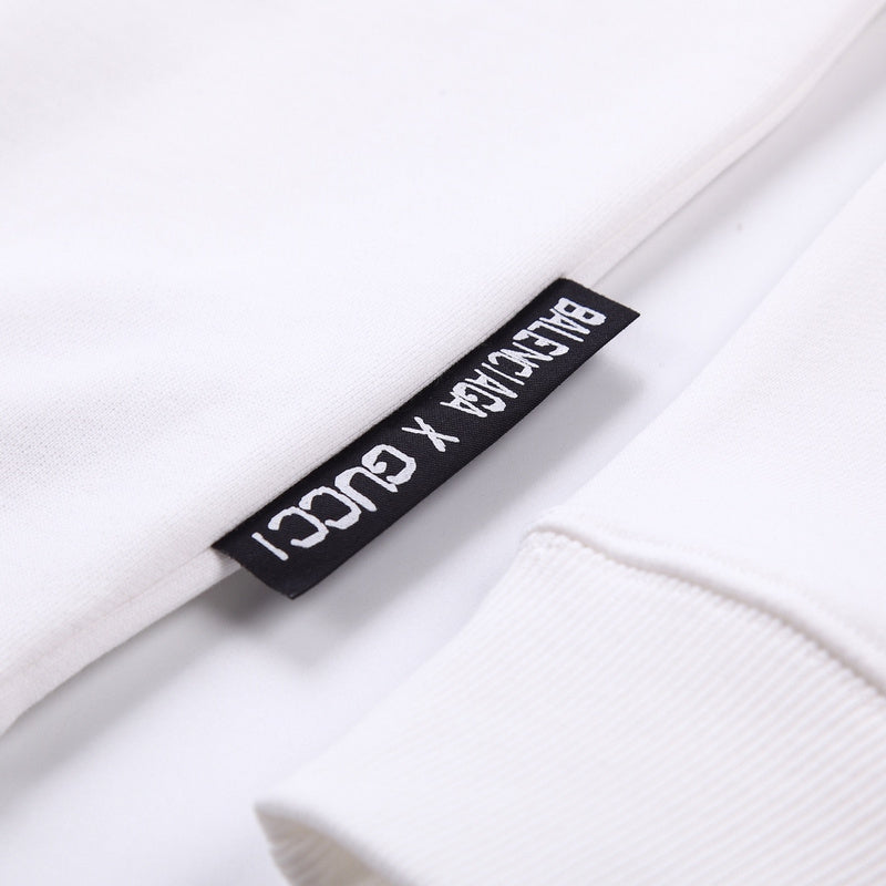 Flat lay presentation of Gucci luxury clothing with tailored silhouette