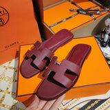 Hermès Grey Slide Sandals - Sole Detail View