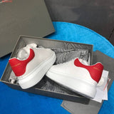 Alexander McQueen sneakers detailed view showing premium designer craftsmanship