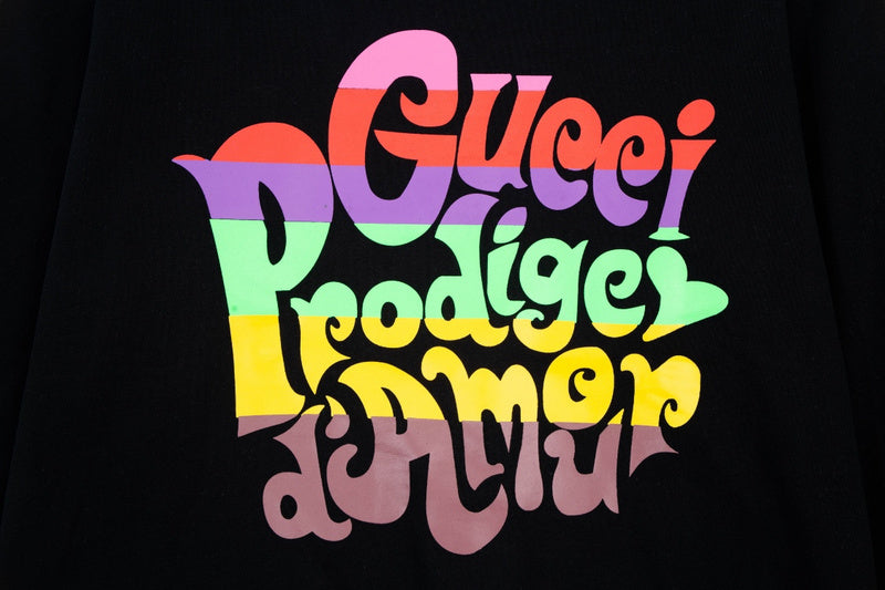 Flat lay presentation of Gucci luxury clothing with relaxed-fit cut