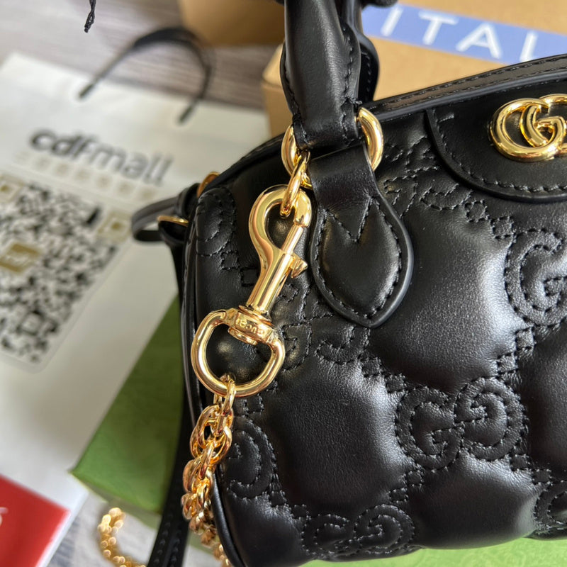 Styled lifestyle shot of structured polished women's handbag – women's luxury accessory