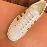 Gucci neutral cream luxury sneakers view 6 minimalist modern build