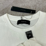 Texture and finish detail of Amiri luxury piece style No.032
