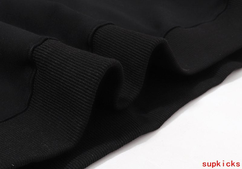 Close-up detail shot of Rhude luxury clothing with everyday silhouette