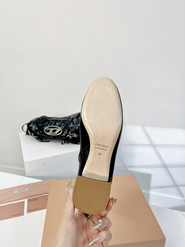 Texture and finish detail of Miu Miu luxury piece style No.128