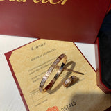 Side view of Cartier unisex jewelry piece