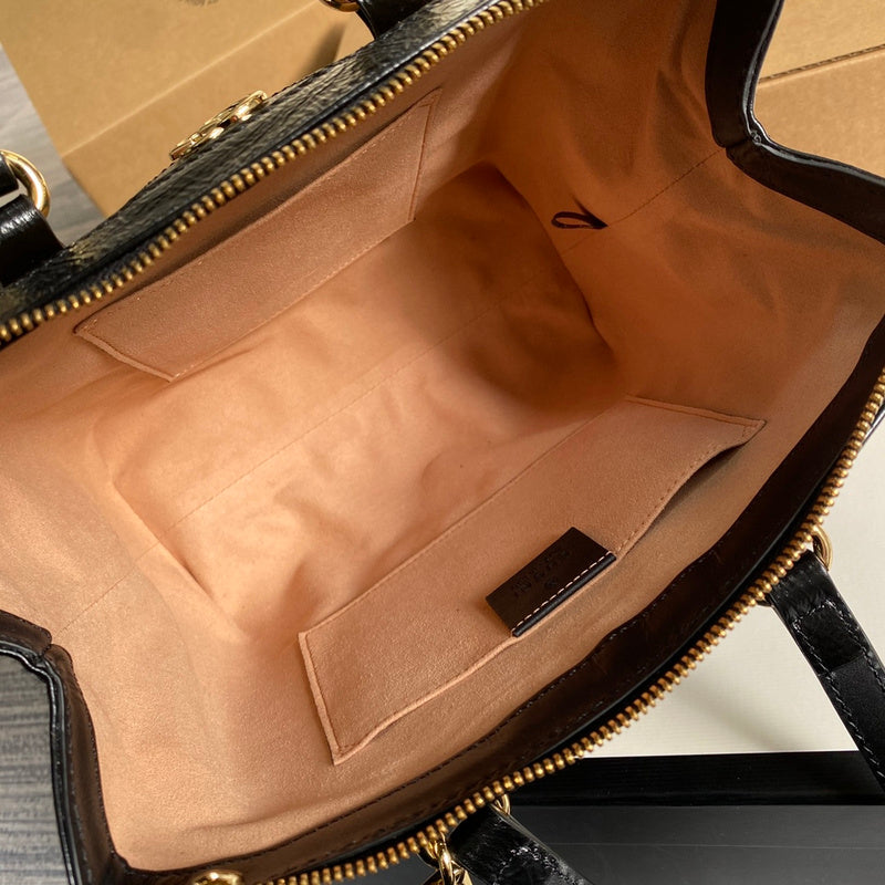 Close-up detail of elevated polished women's handbag – women's statement bag