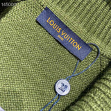 Close-up detail shot of Louis Vuitton luxury clothing with relaxed-fit cut