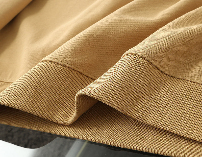 Close-up detail shot of Gucci luxury clothing with signature branding