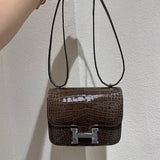  graceful structured bag styled with outfit