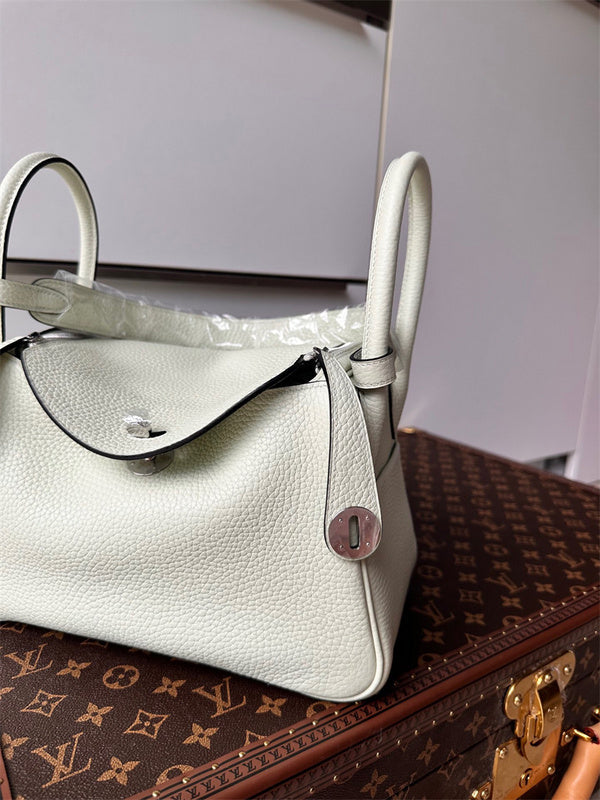  graceful top-handle bag styled with outfit 30