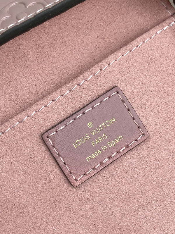 Front view of polished chic women's handbag – women's statement bag