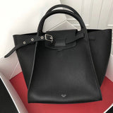 Front view of modern statement women's handbag – women's designer-style accessory