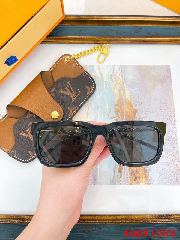 Close-up detail view of Louis Vuitton unisex sunglasses