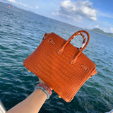  top-handle bag interior and compartment view 9