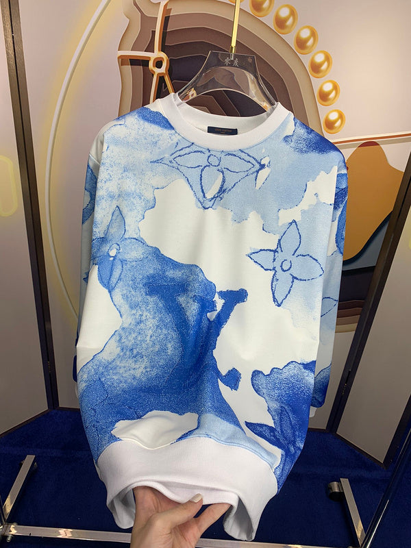 Close-up detail shot of Louis Vuitton luxury clothing with signature branding