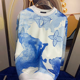 Close-up detail shot of Louis Vuitton luxury clothing with signature branding