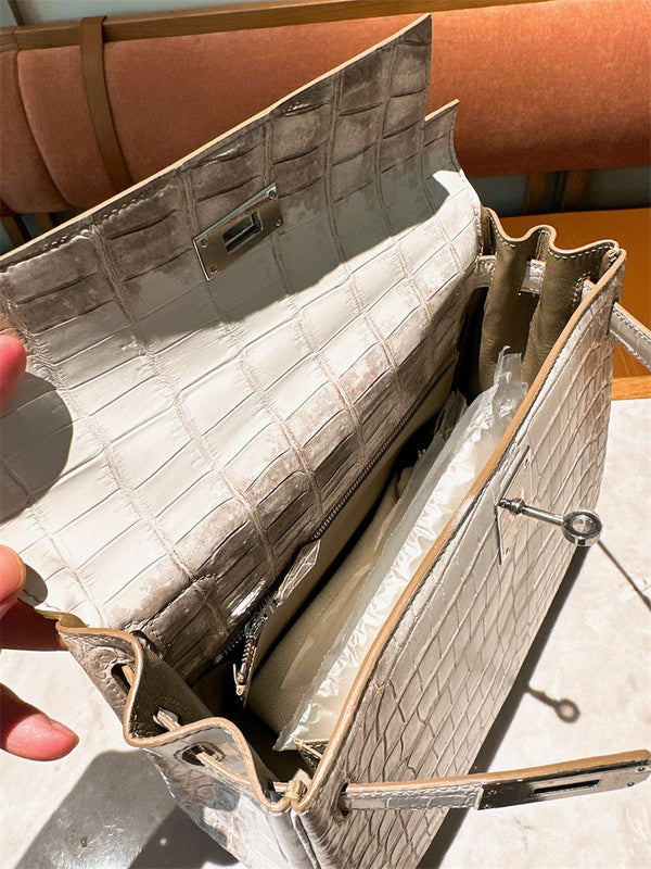 Side view of polished structured handbag