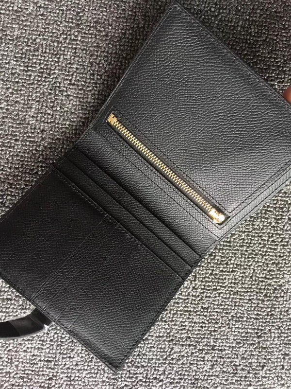 Side view of refined structured handbag