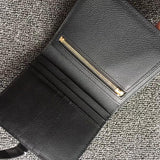 Side view of refined structured handbag