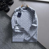 Full styled look of Louis Vuitton luxury clothing with logo-detail design