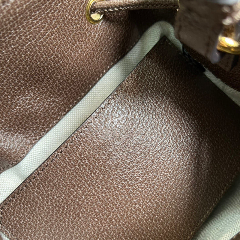 Side profile of classic elevated women's handbag – women's luxury handbag