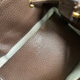 Side profile of classic elevated women's handbag – women's luxury handbag