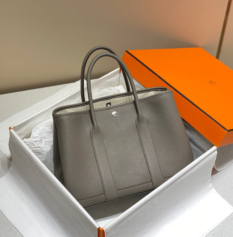 Side view of versatile structured handbag