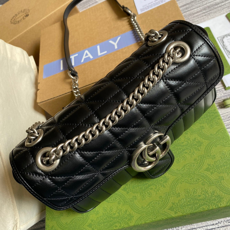 Close-up detail of polished signature women's handbag – women's luxury accessory