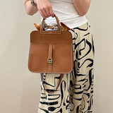 Side view of chic structured handbag
