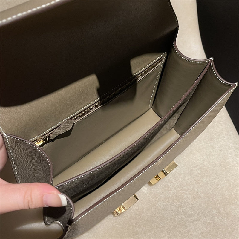 Side view of clean-lined structured handbag