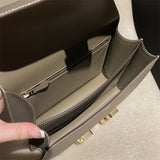 Side view of clean-lined structured handbag
