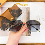 Side view of Louis Vuitton unisex sunglasses