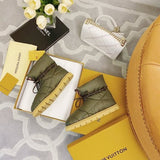 Close-up detail view of Louis Vuitton luxury piece style No.156