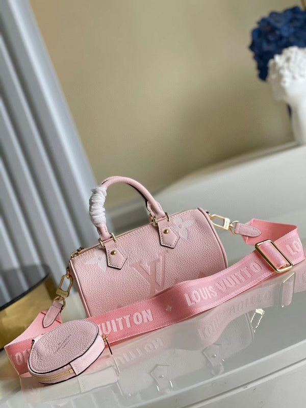 Side profile of polished sleek women's handbag – women's statement bag