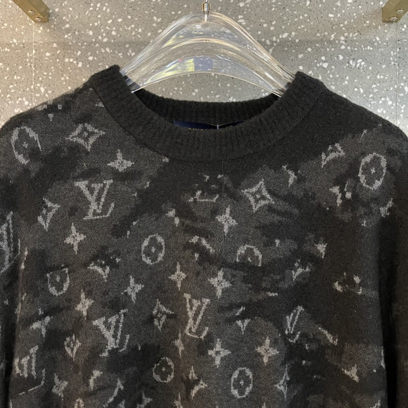 Full styled look of Louis Vuitton luxury clothing with label-forward styling