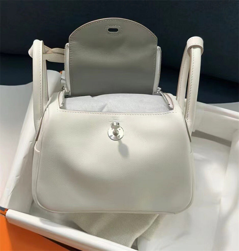Side view of streamlined structured handbag