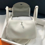 Side view of streamlined structured handbag