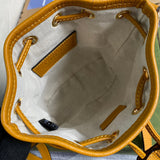 Close-up detail of polished everyday-luxe women's handbag – women's designer-style accessory
