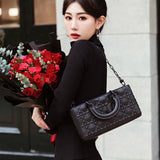 Interior view of elevated modern women's handbag – women's luxury accessory