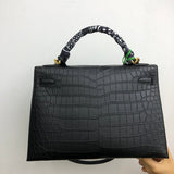 Side view of minimalist structured handbag
