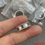 Front view of Van Cleef & Arpels unisex jewelry piece