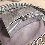 Handle and strap detail of chic modern women's handbag – women's luxury accessory
