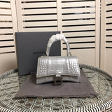Close-up detail of modern classic women's handbag – women's luxury accessory