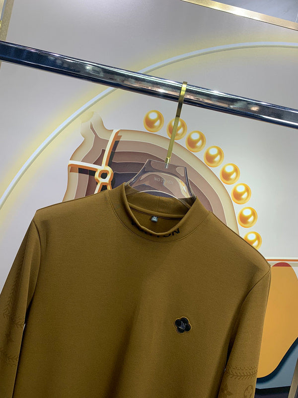 Close-up detail shot of Louis Vuitton luxury clothing with monogram-inspired silhouette